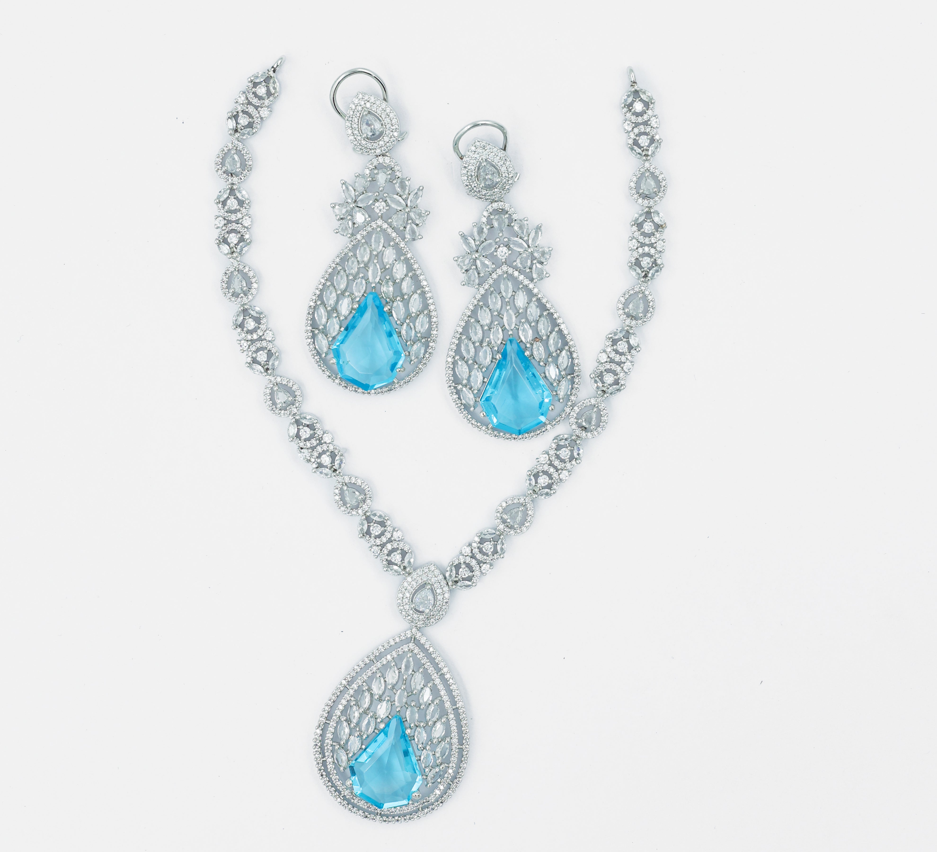 White Rhodium Necklace Set with Cubic Zirconia and Hydro Stones - Adisha Jewels