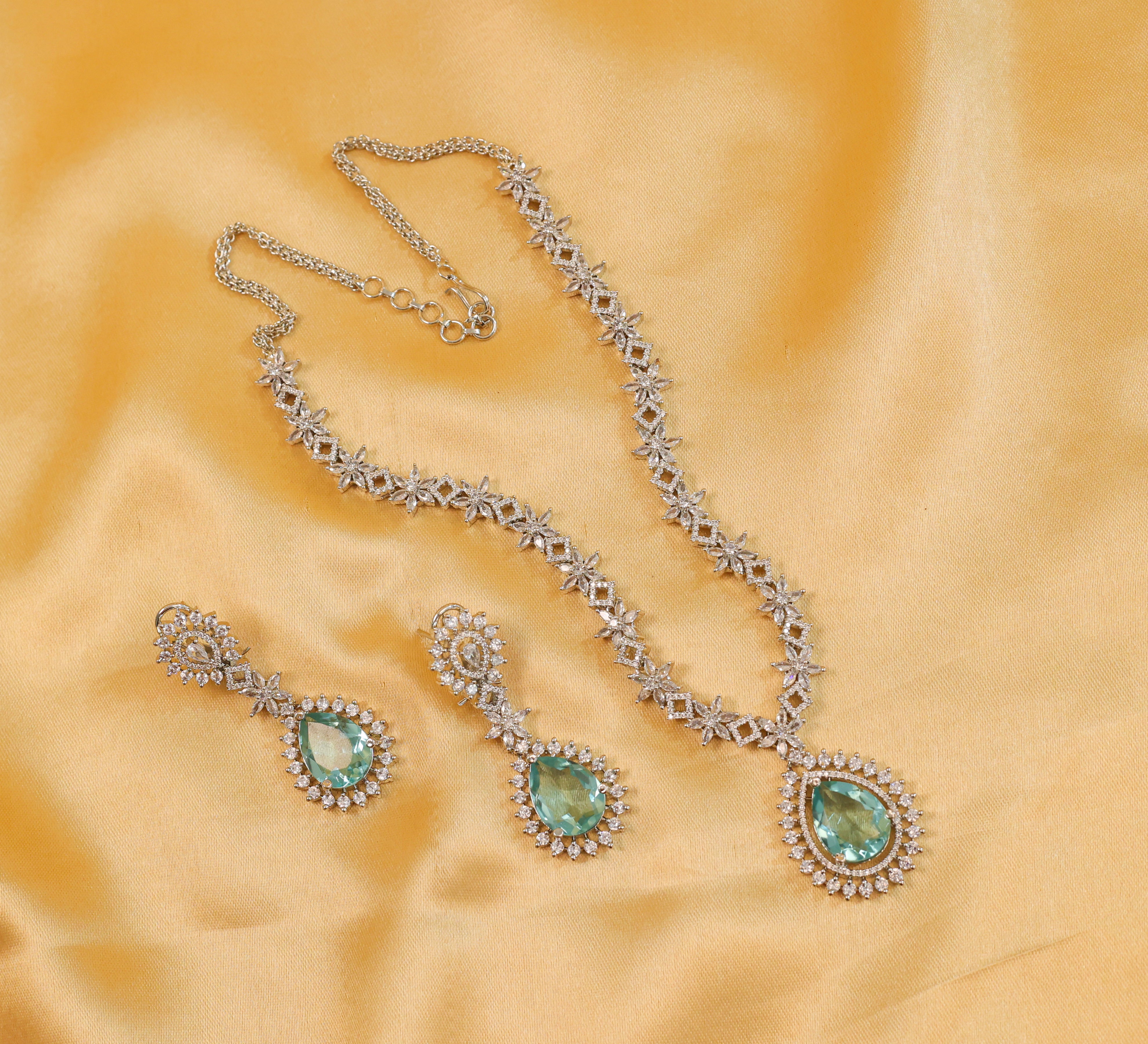 White Rhodium Necklace Set with Cubic Zirconia and Hydro Stones - Adisha Jewels